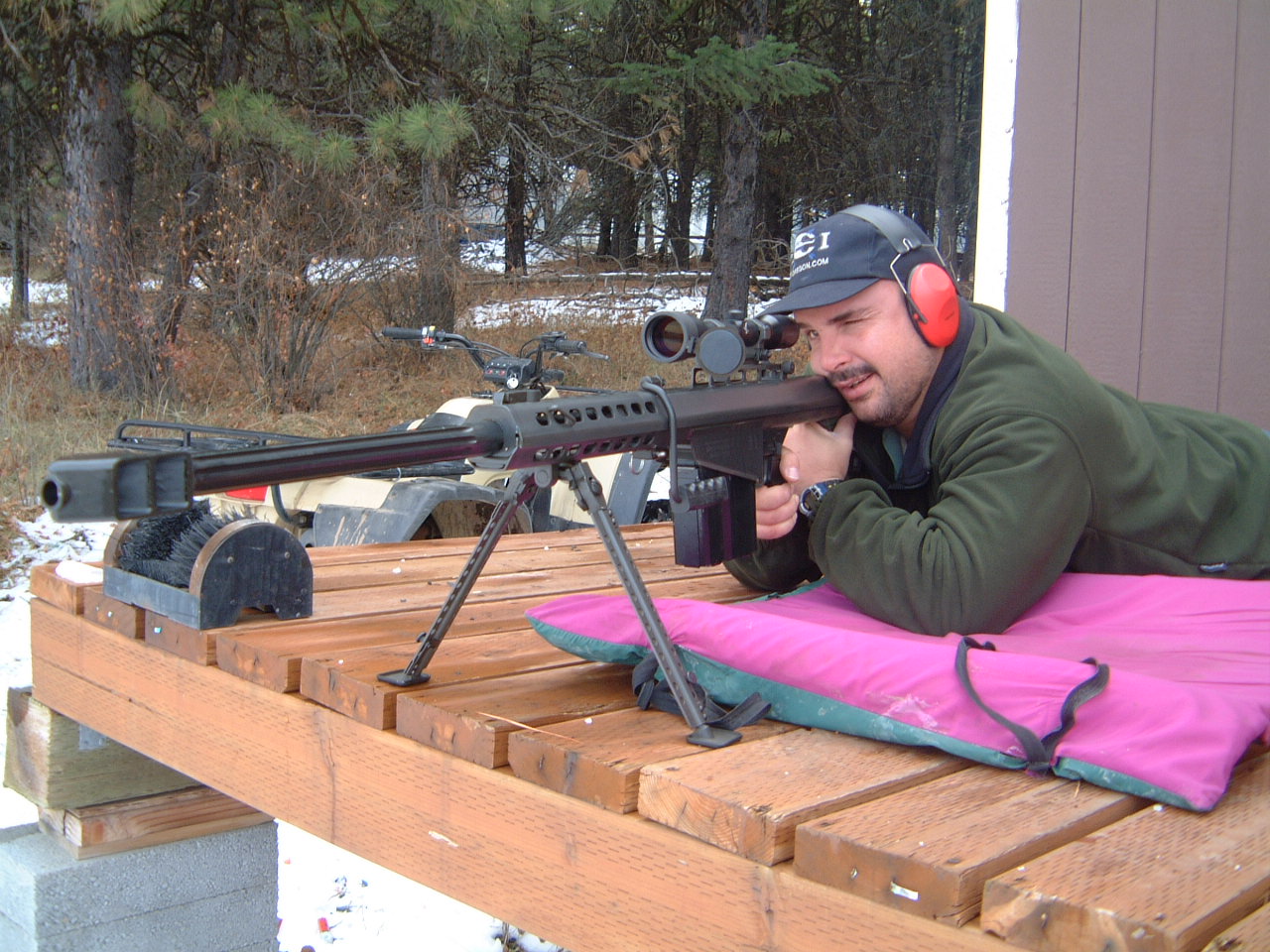 Johan Raath firing a 50 BMG rifle in the United States
