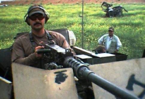 Johan Raath operating a mounted 50-calibre weapon in Iraq