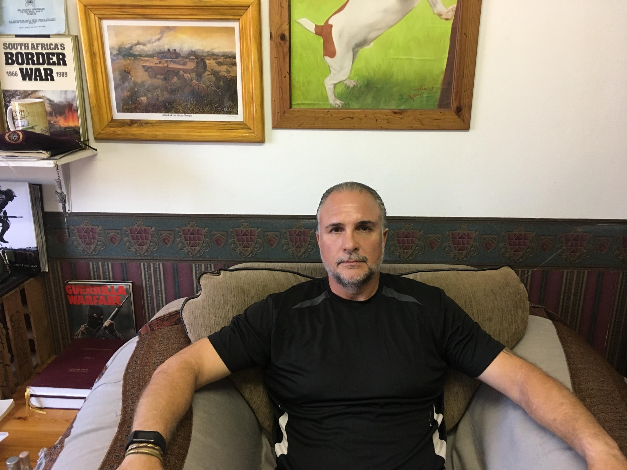 Johan Raath seated at home